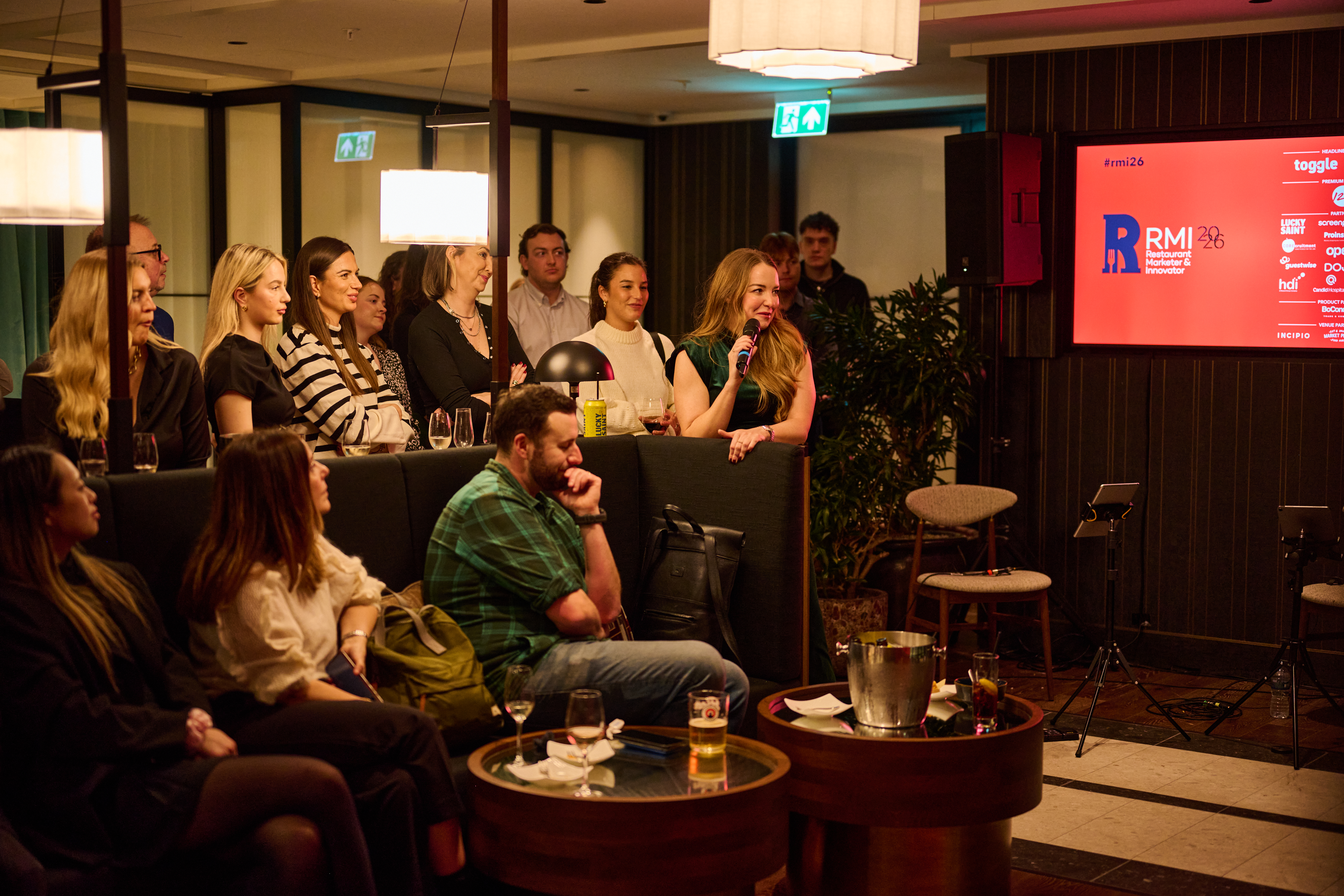 People sitting down at Fulham Pier
