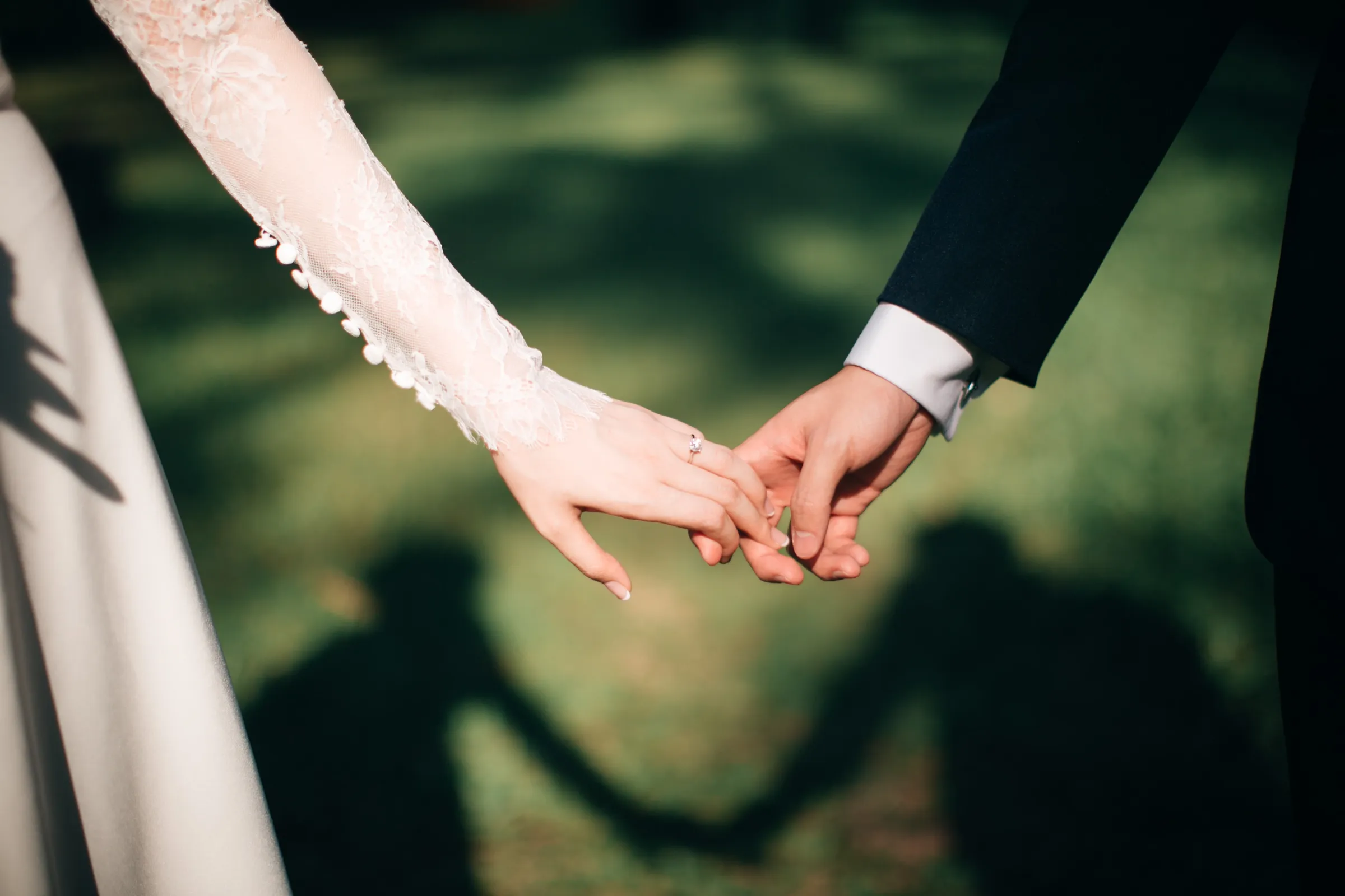 couple-holding-hands-in-unique-wedding-venue
