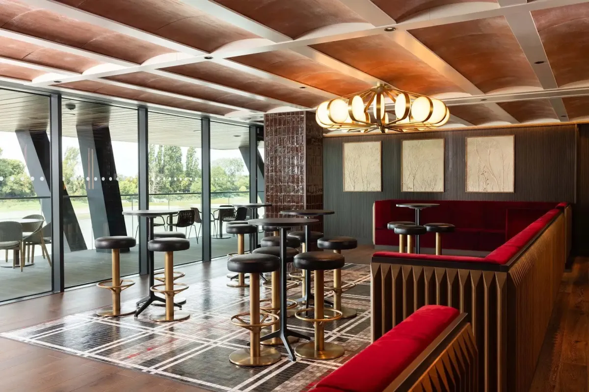 Warmly lit private event room at Fulham Pier