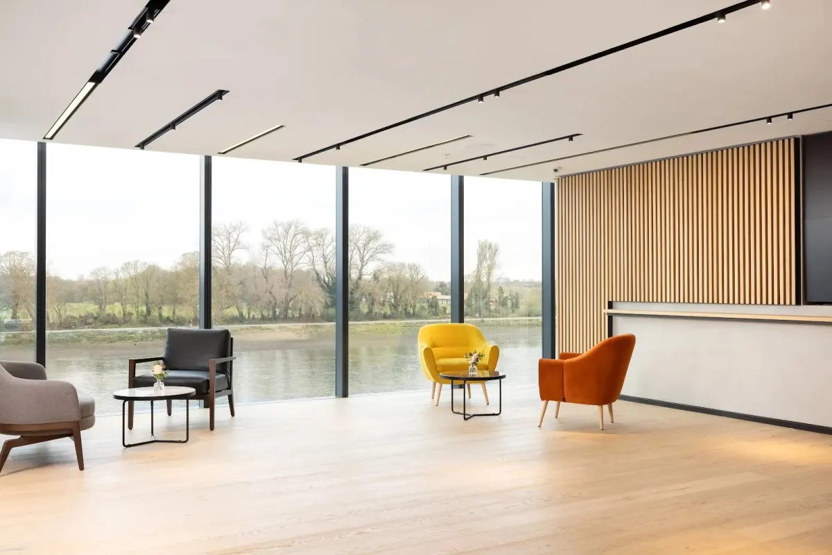 Riverside lounge with floor-to-ceiling Thames views at Fulham Pier