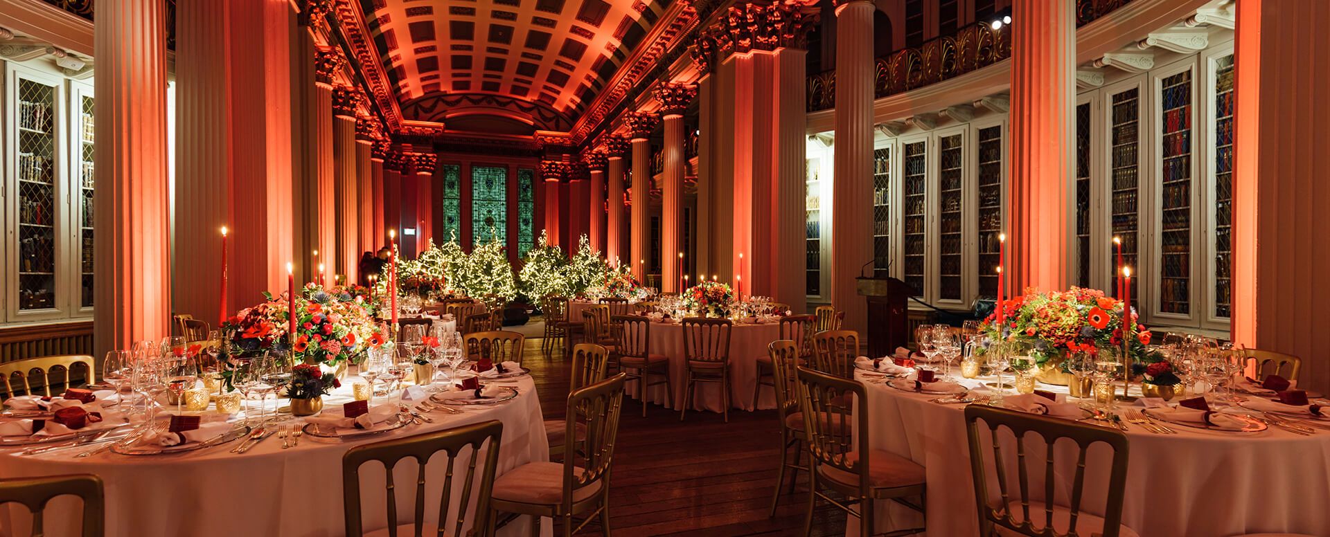 Christmas part with red lights and tables