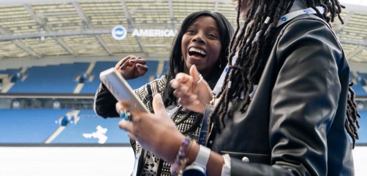 People walking through stadium